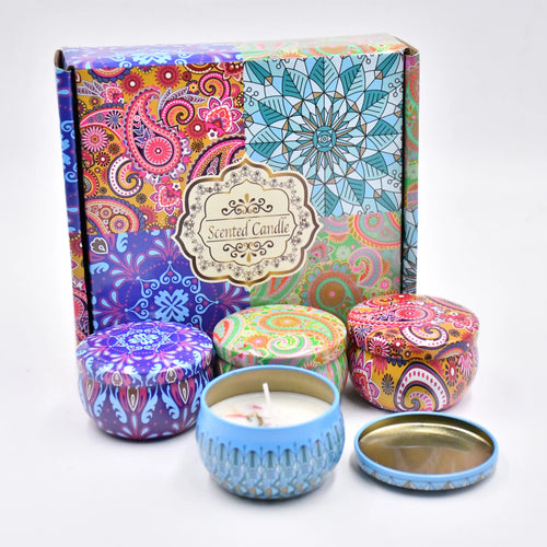 Scented candle gift set in colourful patterned metal tins with matching decorative presentation box.