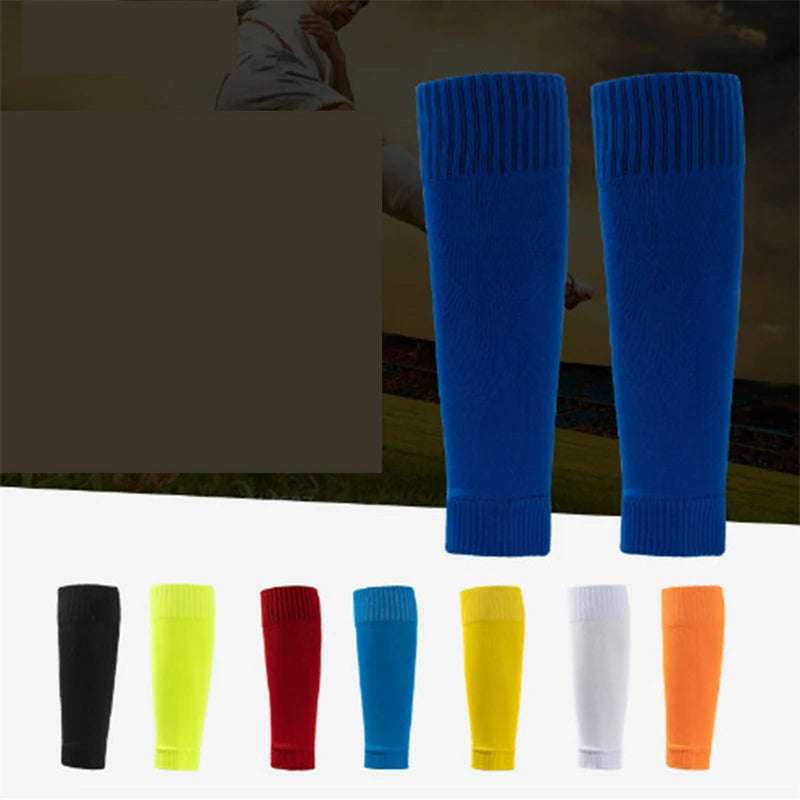 Pair of plain blue football sock sleeves with ribbed cuffs, shown with a selection of other available colours.