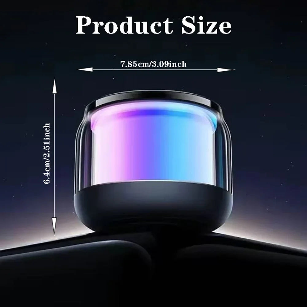 Compact black wireless speaker with an illuminated, multicoloured LED core, showing dimensions of 7.85cm by 6.4cm.