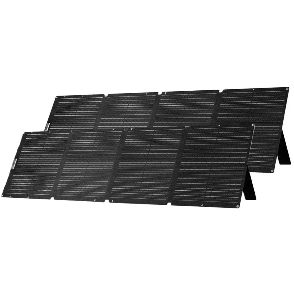 Two portable solar panels, each with four foldable black panels, standing upright on a white background.