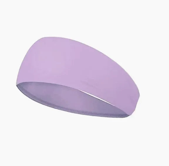 A plain, wide lilac sports headband against a white background.