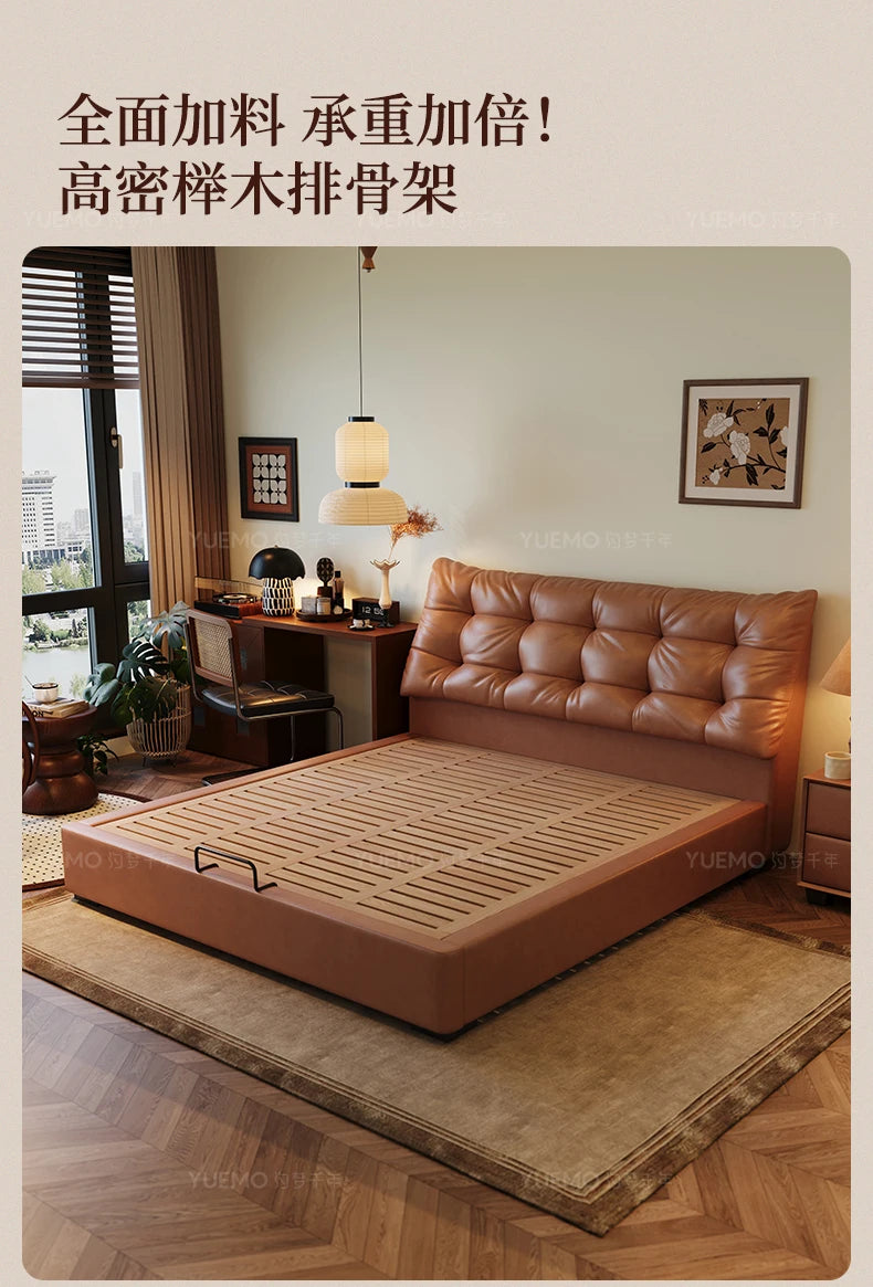 Modern Nordic double bed in tan leather, featuring a tufted headboard and slatted wooden base in a stylish bedroom.