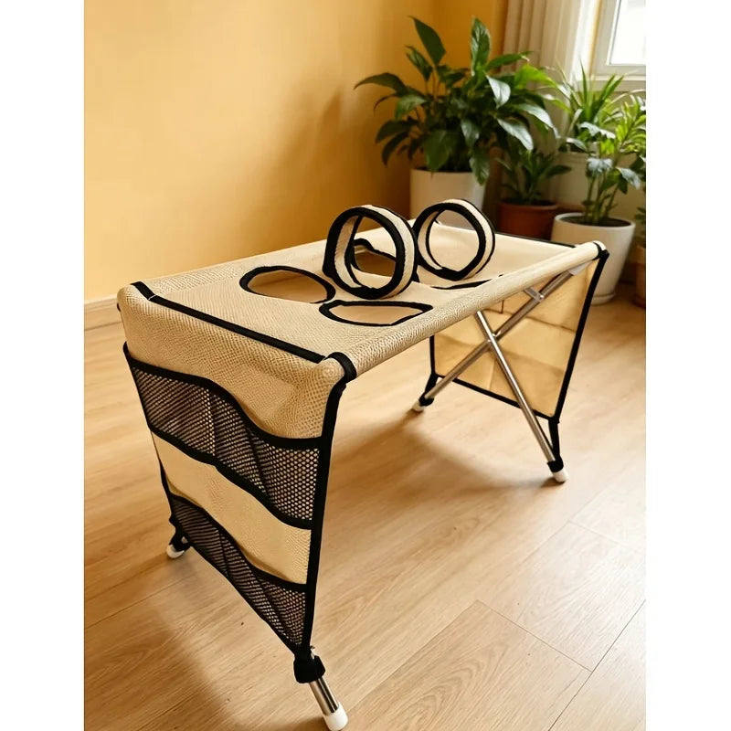 Beige pet grooming table with black trim, mesh panels, folding metal legs, and two attached support loops.