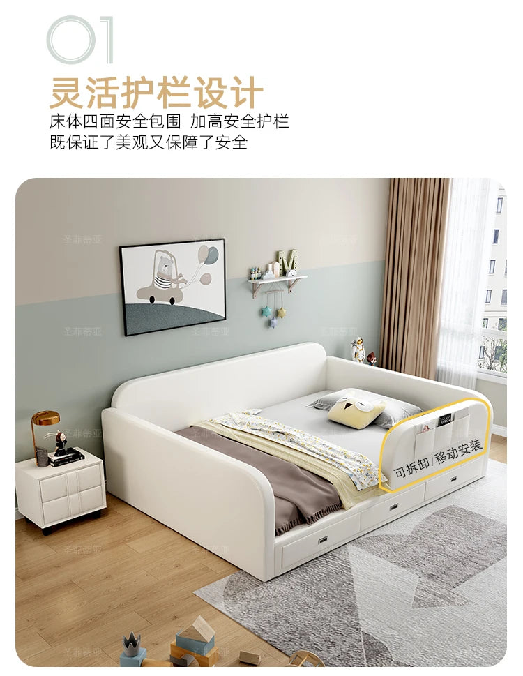 Modern white upholstered storage bed for children, featuring raised safety sides and built-in under-bed storage drawers.