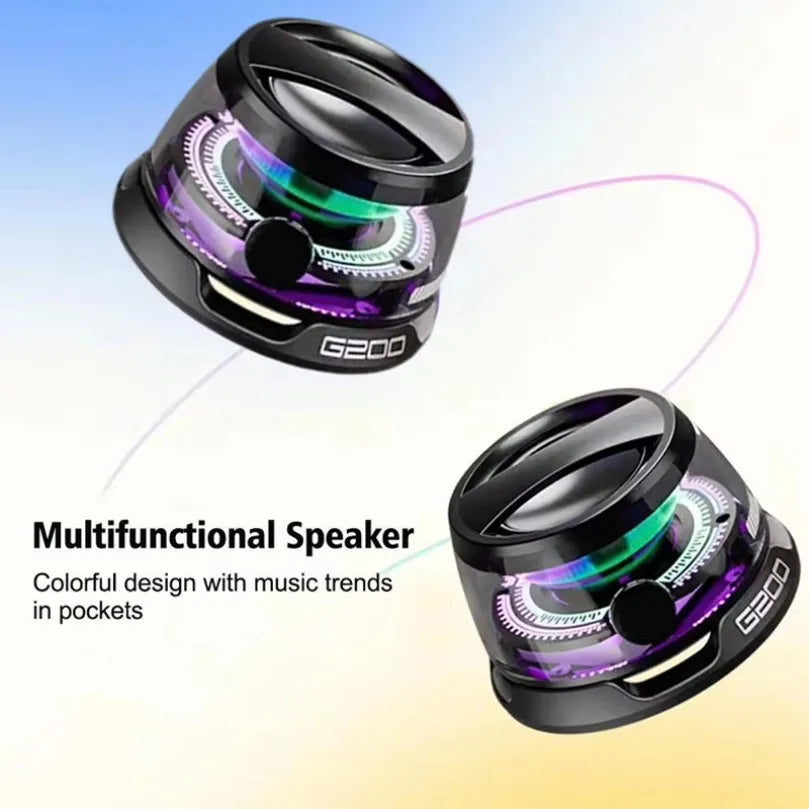 Black portable speaker with clear casing, vibrant RGB lighting, and an integrated phone holder.