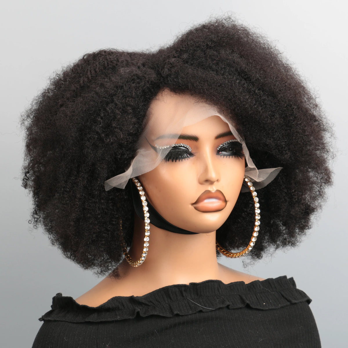 Black kinky curly afro bob human hair lace front wig on mannequin.