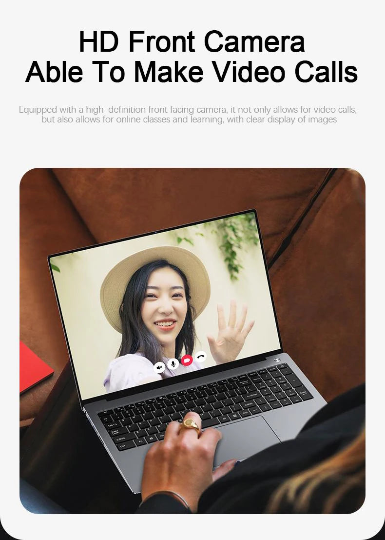 Sleek silver 15.6-inch touchscreen laptop with a black keyboard, showing a person on a high-definition video call.