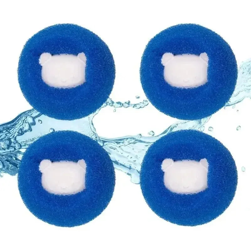 Four round, blue scrubbing sponges featuring a white bear-shaped centre, displayed against a splash of water.
