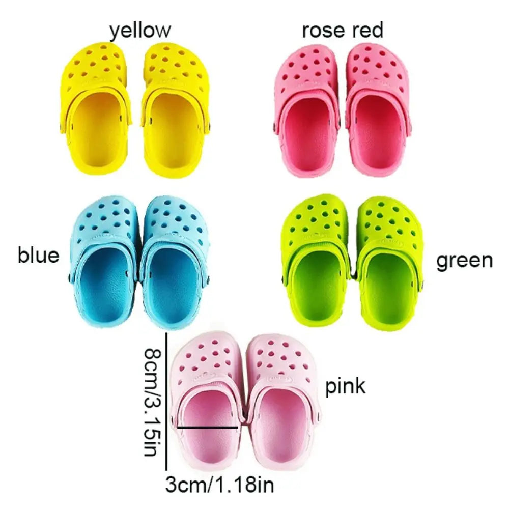 A selection of colourful, perforated non-slip sandals for cats in yellow, rose red, blue, green, and pink.