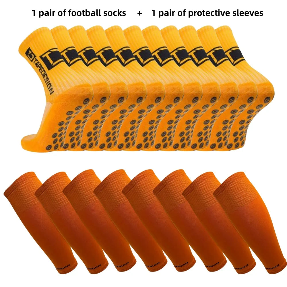 Set of bright orange football grip socks and matching protective leg sleeves for enhanced performance.