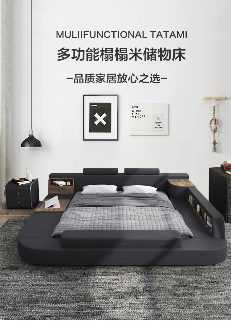 Modern charcoal grey upholstered bed with integrated side shelves, storage drawers, and a built-in workspace.