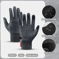 Pair of grey thermal gloves featuring non-slip silicone palms, water-repellent fabric, and fleece lining.