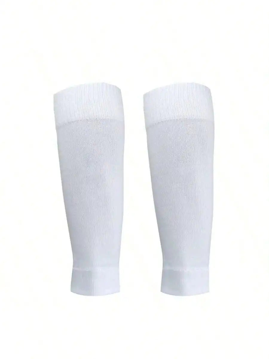 Pair of plain white football sock sleeves with ribbed cuffs, isolated on a white background.