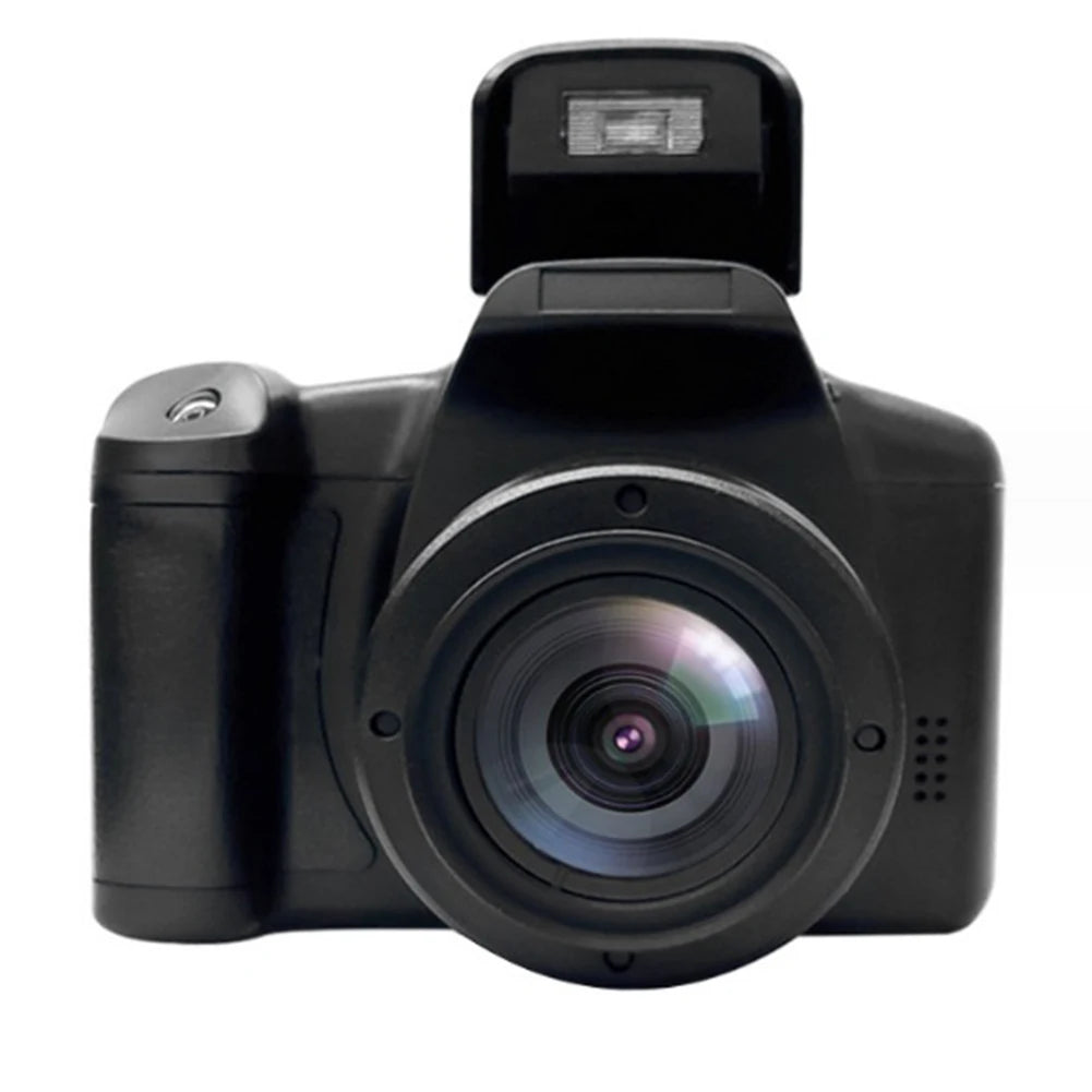 Black plastic DSLR camera with a center lens and a pop-up flash unit on top, isolated on white background.