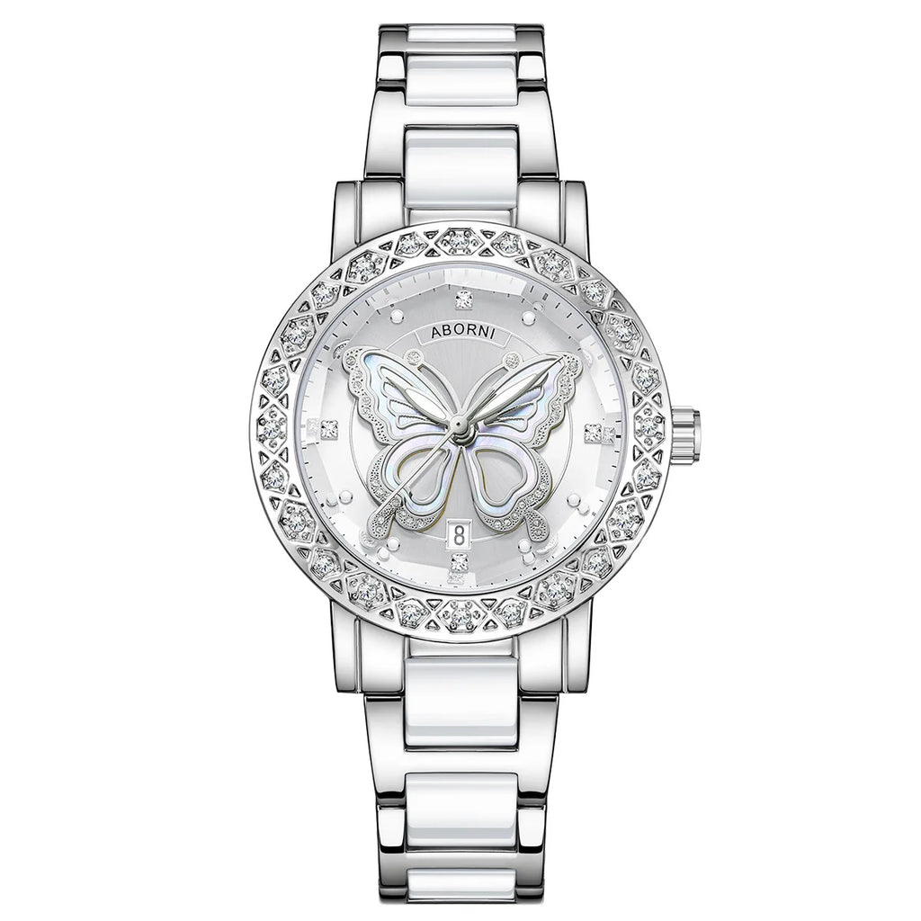 Luxury silver and white women's watch featuring a crystal-embellished bezel and a central butterfly motif dial.