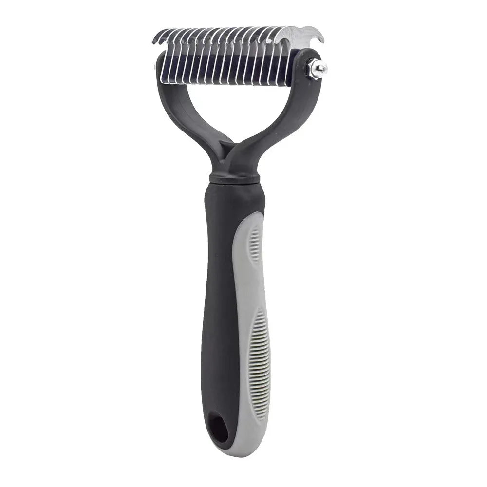 Black and grey pet de-shedding rake with a curved metal blade head and an ergonomic non-slip rubber grip handle.