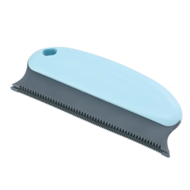 Blue and grey pet grooming shedding tool with a serrated metal edge and ergonomic handle.