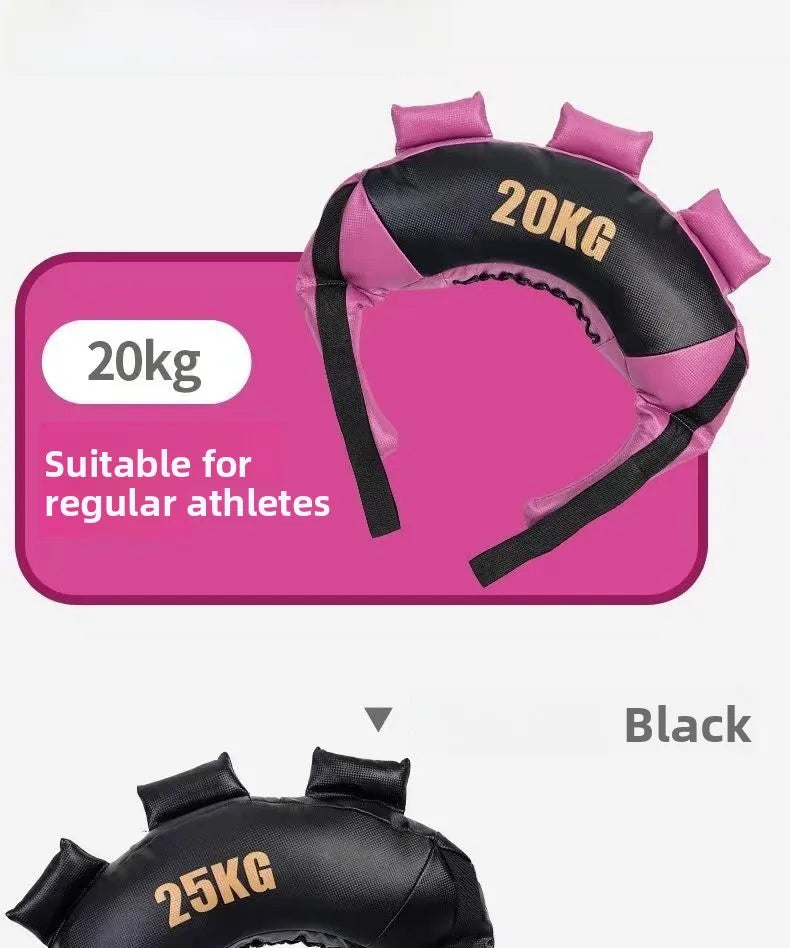 Black and pink weighted Bulgarian training bags with multiple handles, marked with 20kg or 25kg weight labels.
