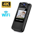 Black plastic body camera with textured surface, LCD screen, 4K camera lens, and built-in WiFi capability.