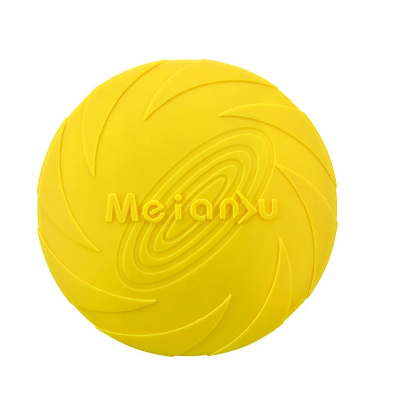 A bright yellow, durable silicone flying disc dog toy with a swirled, textured surface design.
