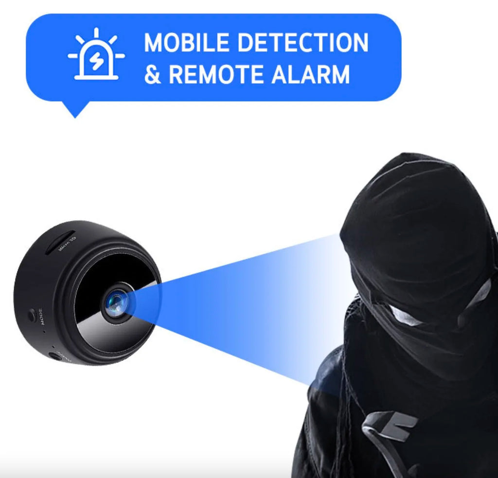 Small black plastic circular security camera with a microSD slot and motion detection feature.