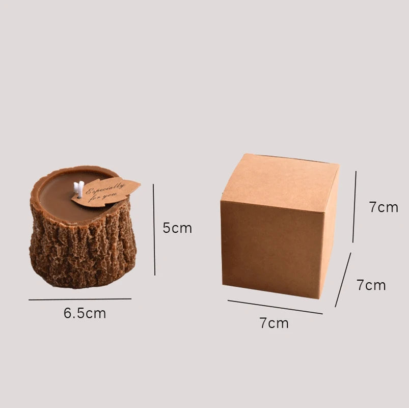 Brown tree stump-shaped scented candle with 'Especially for you' tag, next to its plain brown square gift box.