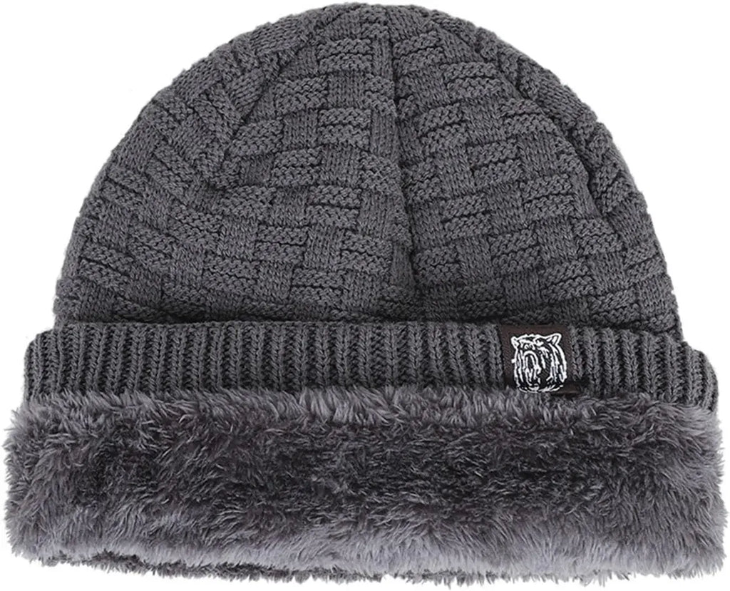 Grey knitted unisex beanie with a textured basket-weave pattern and a soft, plush faux-fur lining.