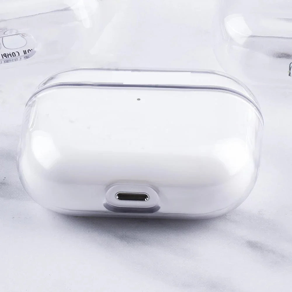 Clear protective case for AirPods Pro on a marble surface.