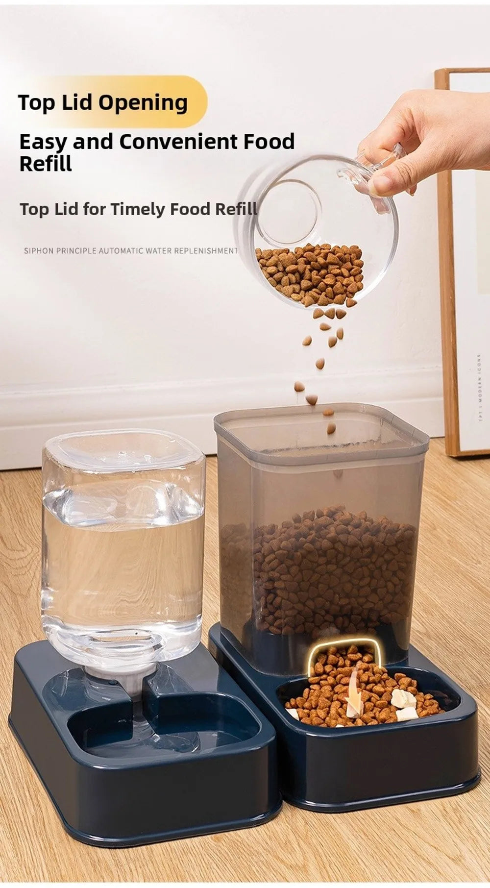 Automatic pet feeder and water dispenser set in navy blue with clear, square containers on a light wood floor.