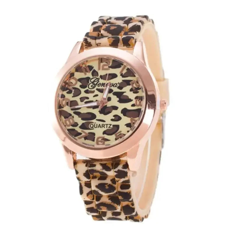Women's quartz watch with a leopard print dial and matching silicone strap, finished with a rose gold-tone metal case.