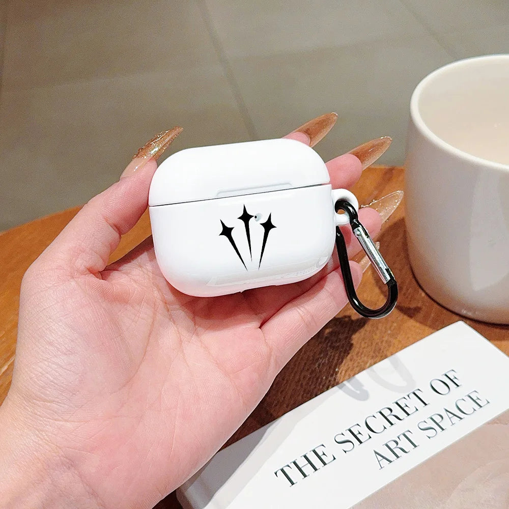 White, glossy silicone AirPods Pro case with black star motif and black carabiner clip.