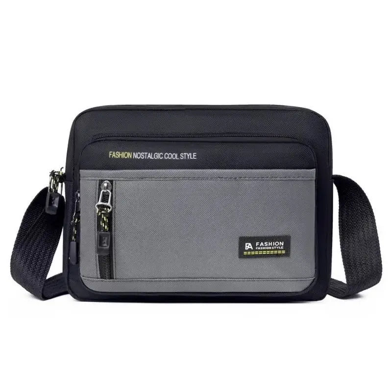 Black and grey men's crossbody bag with an adjustable strap, multiple zipped compartments, and durable fabric design.