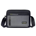 Black and grey men's crossbody bag with an adjustable strap, multiple zipped compartments, and durable fabric design.