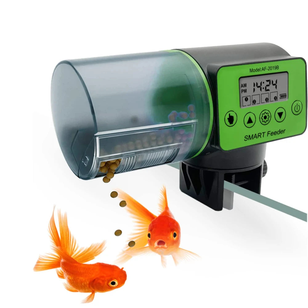 Automatic fish feeder with a green digital display panel, transparent food container, and clamp for aquarium mounting.