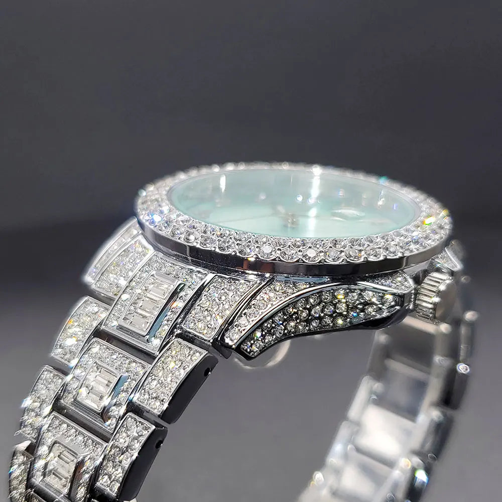 Side view of a silver-toned women's dress watch encrusted with sparkling clear crystals on the bezel and bracelet.
