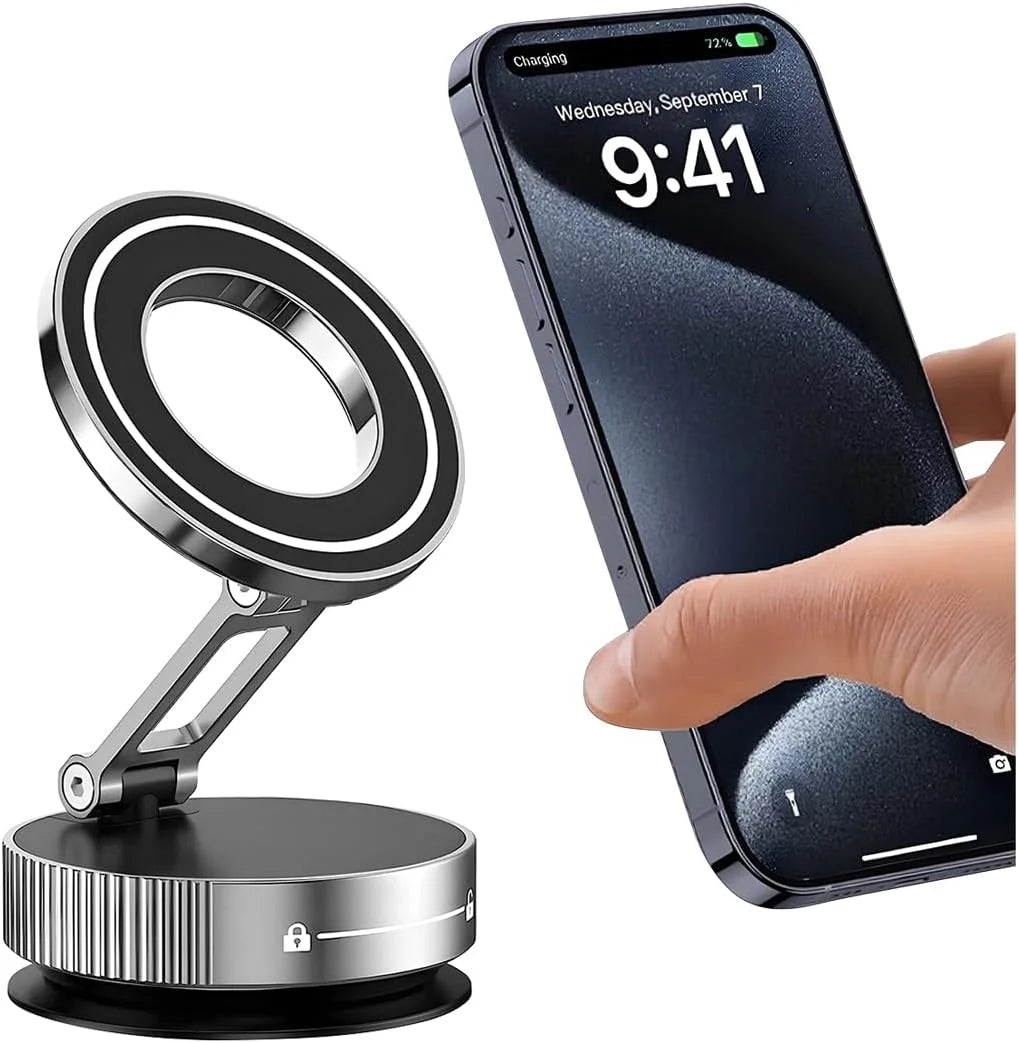 Silver and black magnetic phone stand with an adjustable arm, shown next to a smartphone being held by a hand.