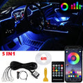 Car interior lit with blue fiber optic RGB ambient lights, showing kit parts including remote and app control.