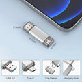 Silver 512GB dual-ended USB flash drive with protective caps, showing USB 3.0, Type-C connectors, and hanging loop.