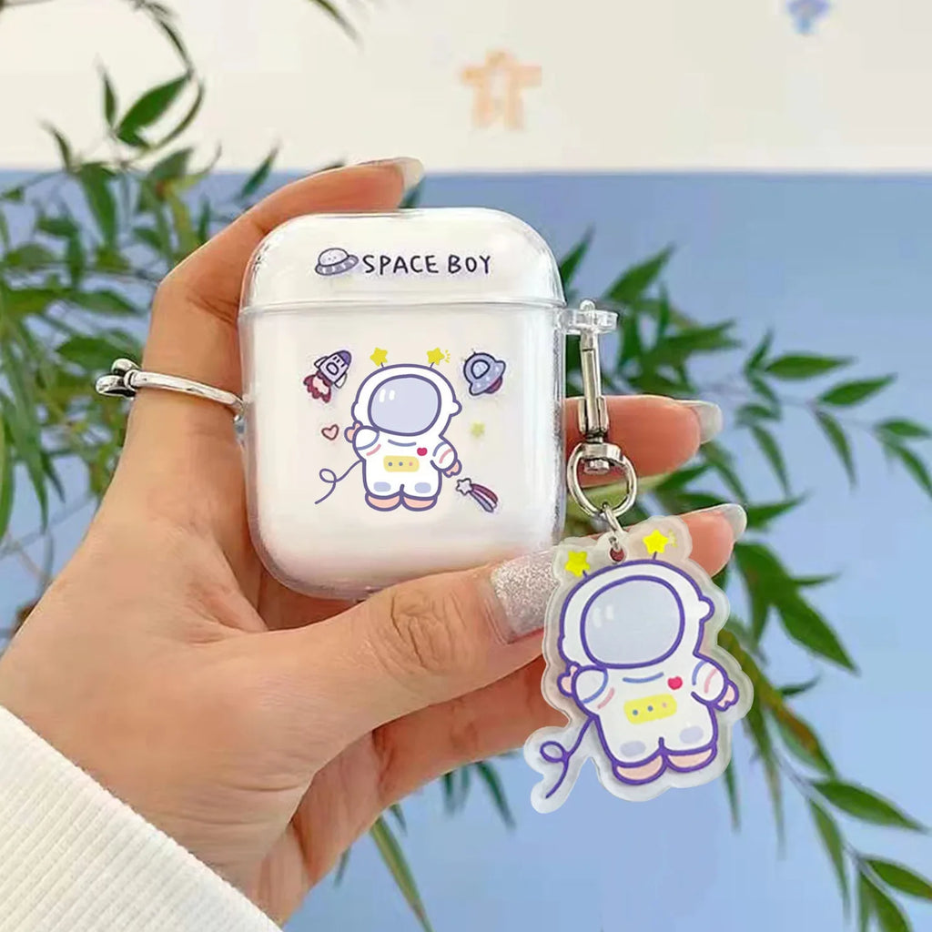 Clear protective case for AirPods with Space Boy astronaut print and matching charm.