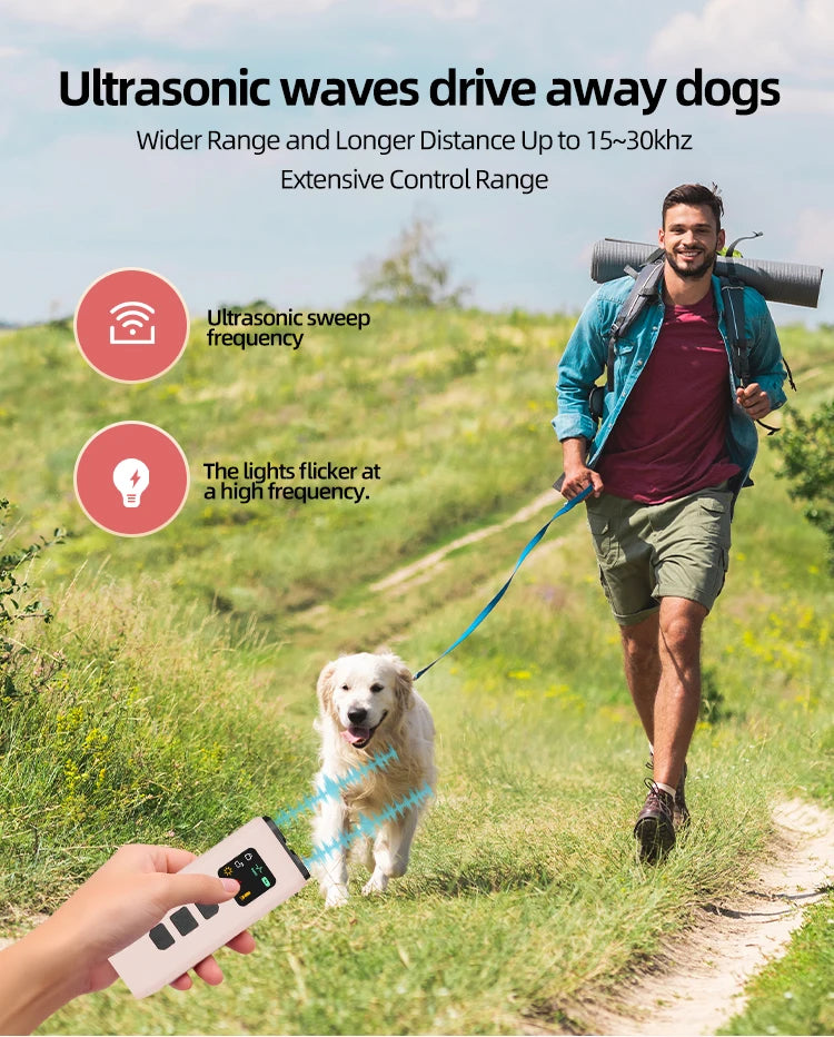 A hand holds a compact, beige rechargeable dog deterrent device with LED strobe and ultrasonic features in a park.