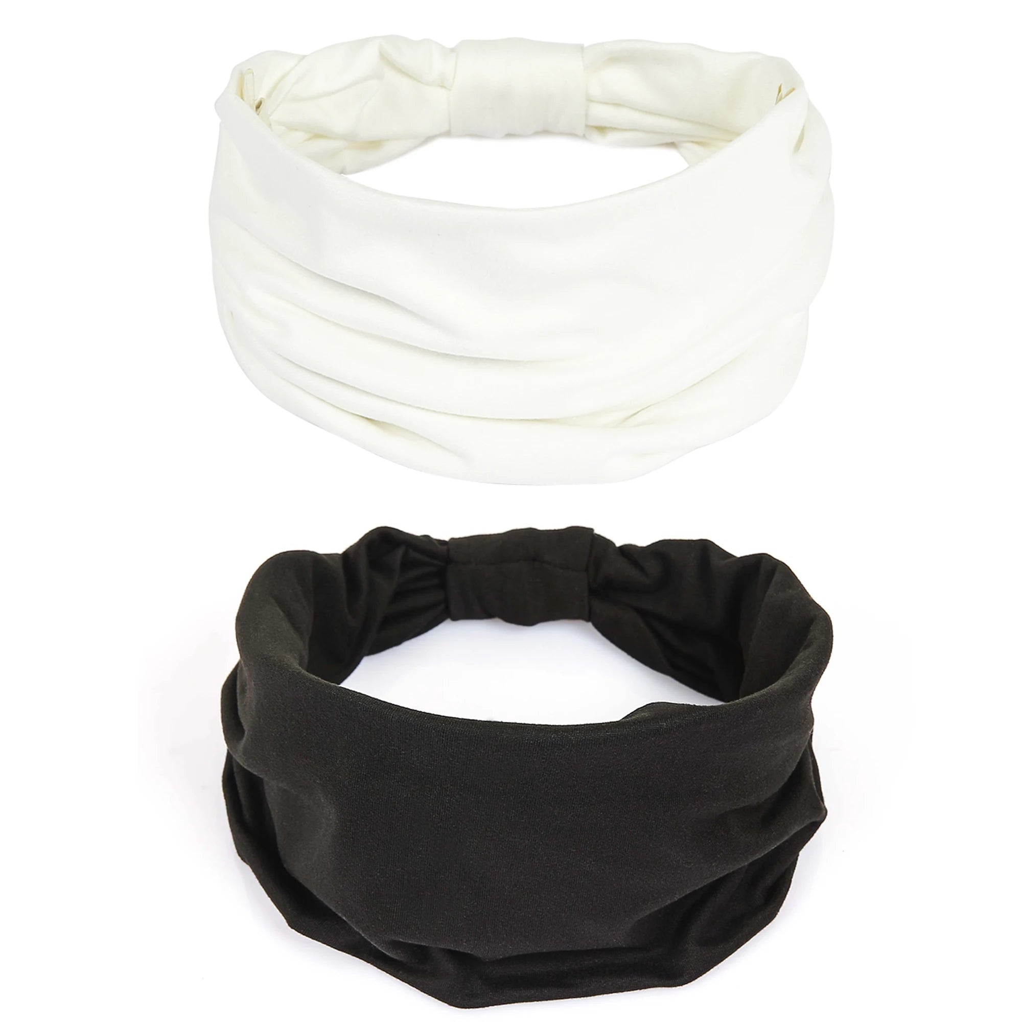 A pair of wide, soft-touch headbands in cream and black with a gathered knotted detail at the back.